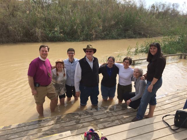Pilgrims from the diocese of Olympia hanging out in the very cold waters of the Jordan River.