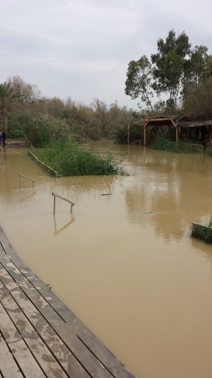 This picture is taken from the Israel side of the Jordan. The open structure on the other side is in Jordan. Inside it are armed Jordanian soldiers who are keeping a close eye on us.