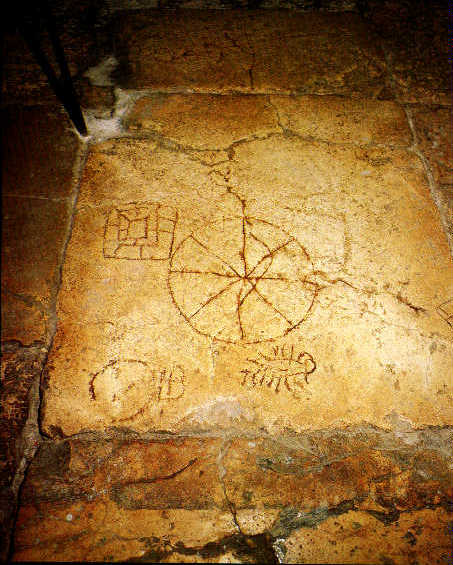 The King's Game carved into a Roman paving stone